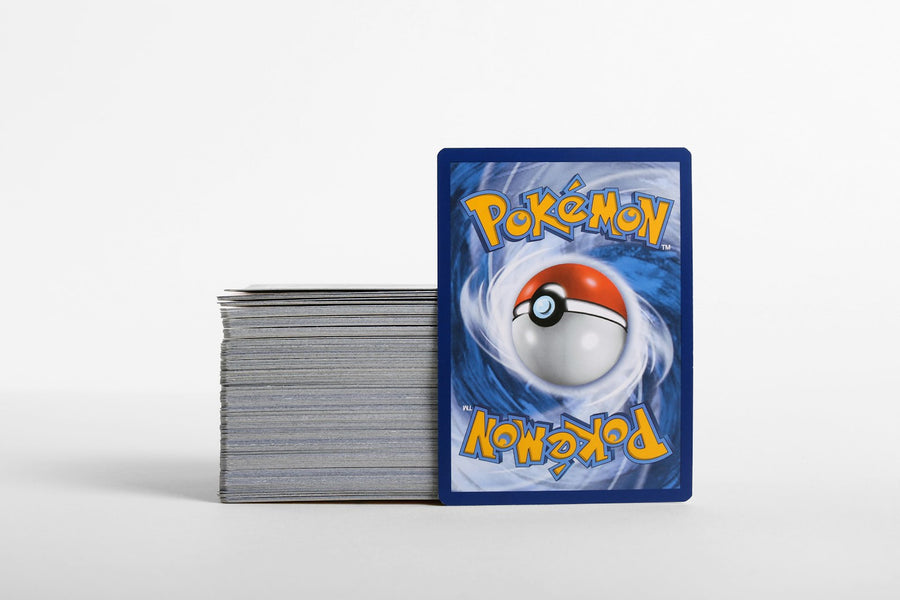 Photo: Giorgio Trovato on Unsplash — a stack of Pokémon cards face down