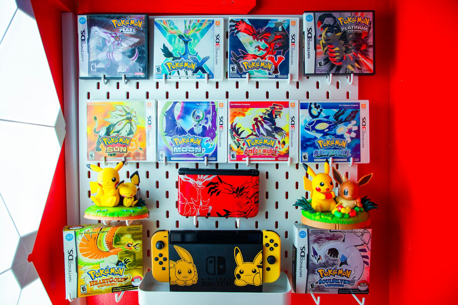 Photo: Branden Skeli on Unsplash — a collector's display of Pokémon trading cards and figurines