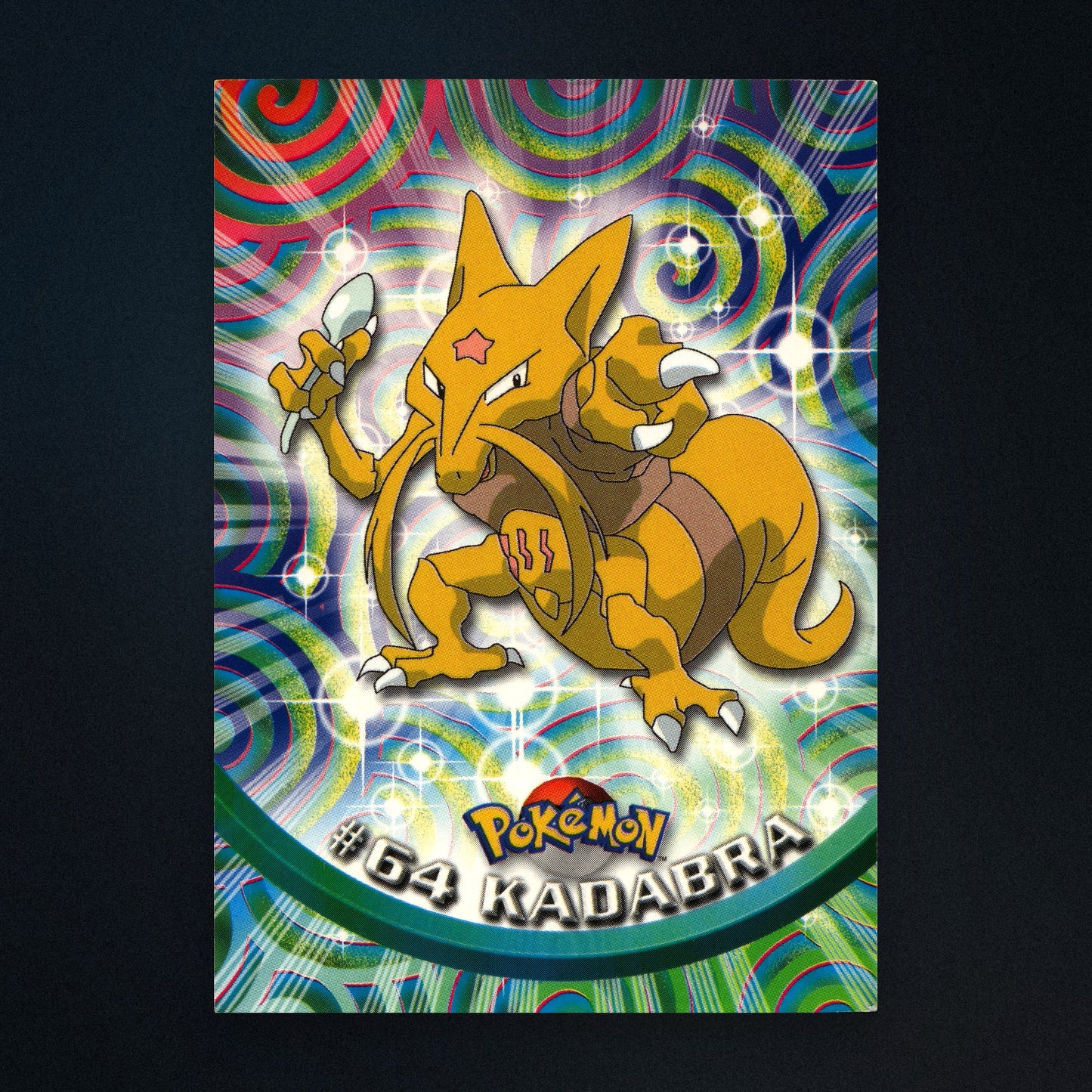 Kadabra #64 - 1999 Topps Pokémon TV Animation Series 1 Silver Foil - Moderately Played front